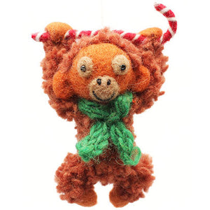 Orangutan with Candy Cane