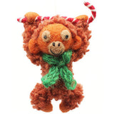 Orangutan with Candy Cane